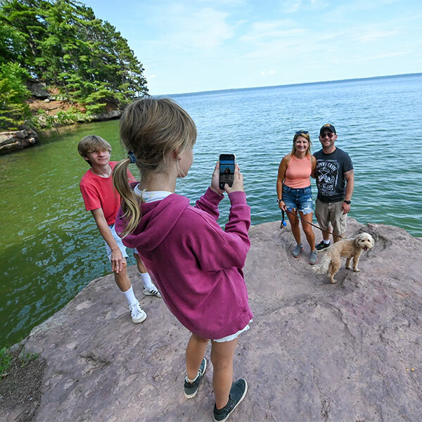 little girl taking family picture in washburn wi